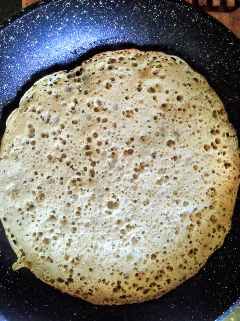 sourdough pancake ready to flip