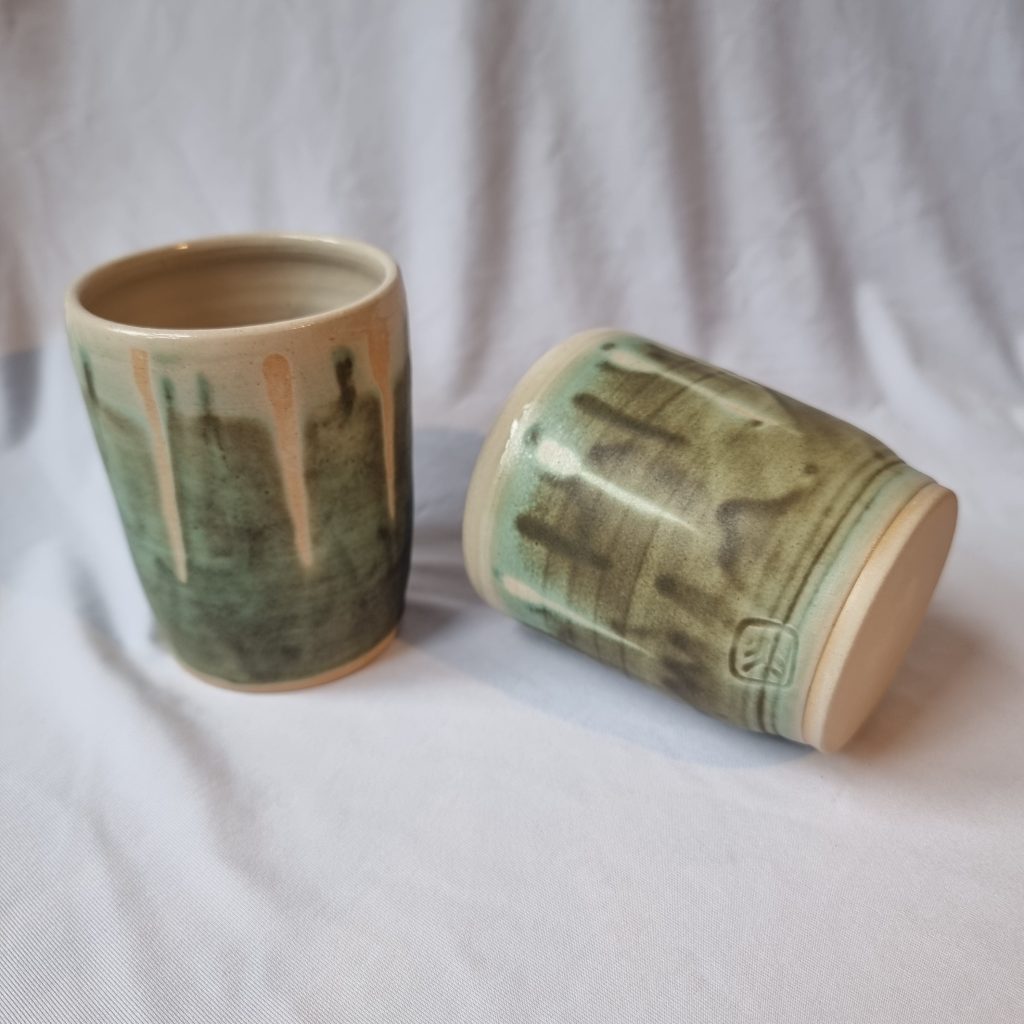 2 green beakers