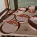 raw glazed pots ready to be fired